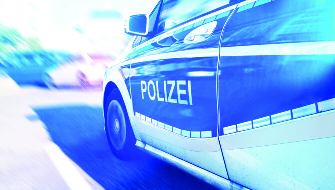Polizei car driving with blur